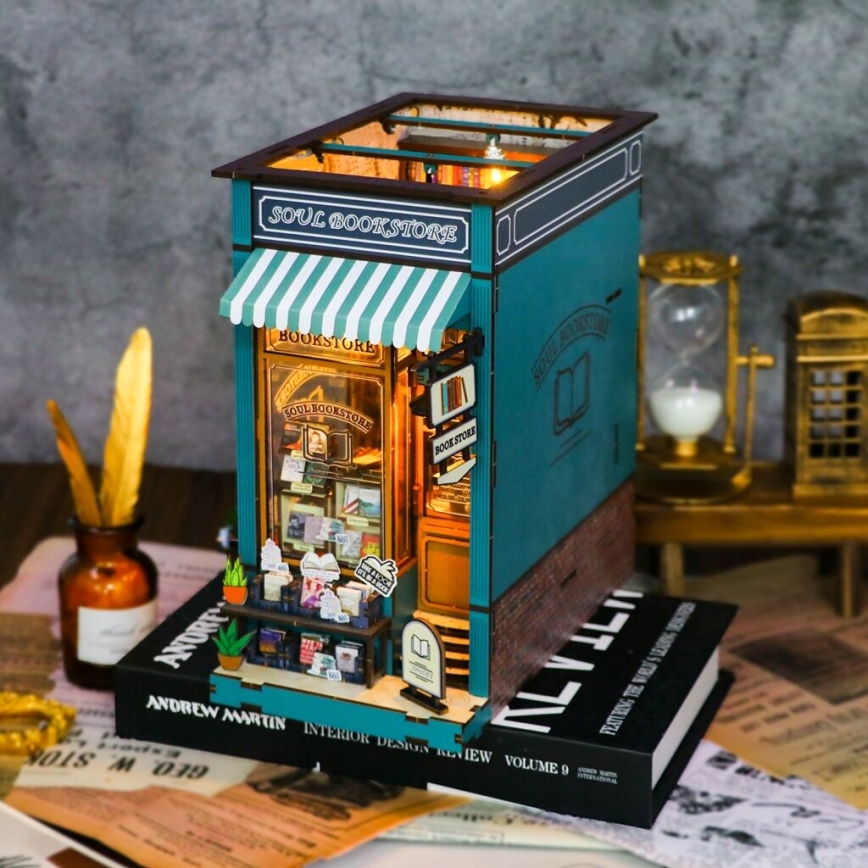 2Kids Toys - 3D-Puzzle LED Buchstütze Buchhandlung Seele 2xAAA