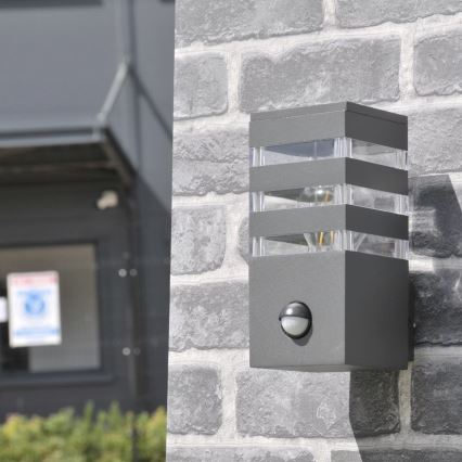 Außenwandleuchte mit Sensor TEKSAS 1xE27/12W/230V IP44 Anthrazit